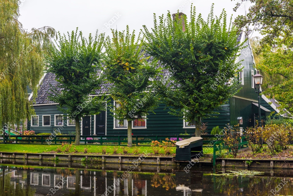 Traditional Dutch houses and windmills in Zaanse Schans. The Zaanse ...