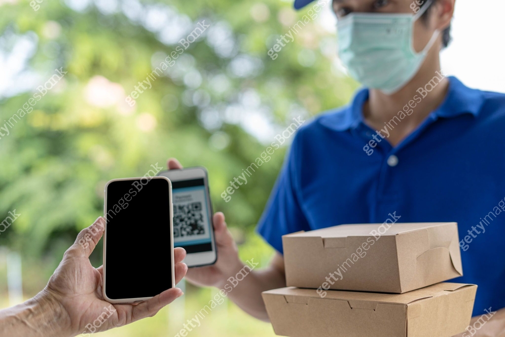woman scan QR code for pay of food. Delivery man send deliver express ...