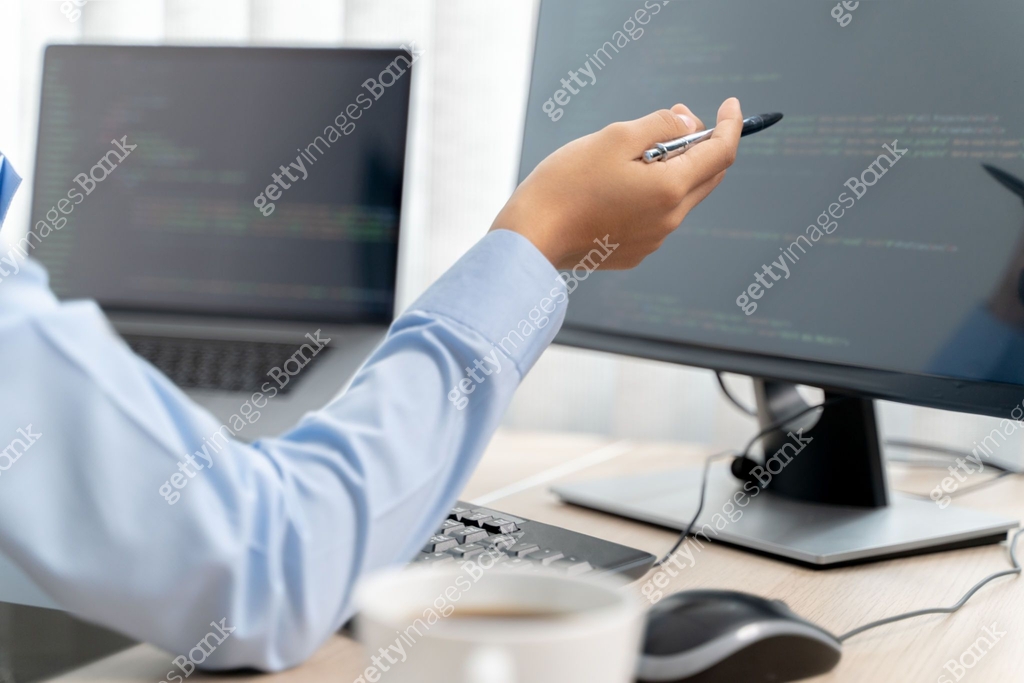 Applications Programmer Programming developing software application. programmer writing program ...