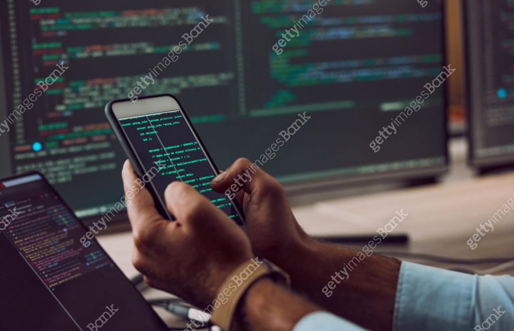 Phone in hands, code and man coding, programmer and software update ...