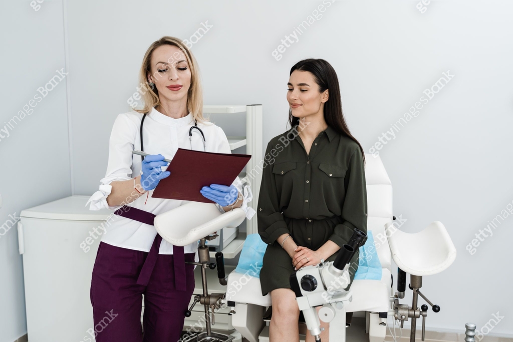 Consultation with gynecologist before colposcopy and pap test procedure ...
