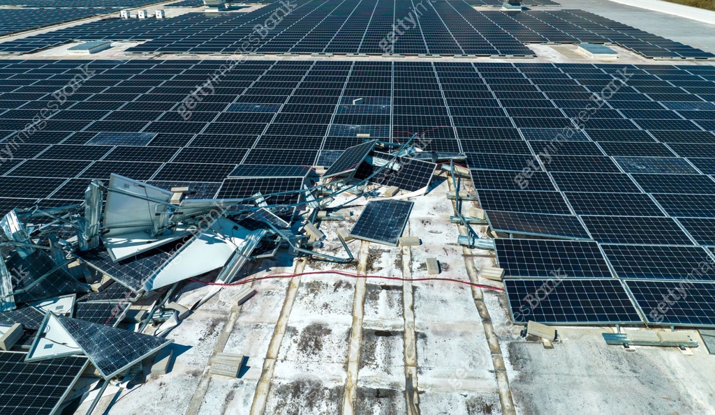 Broken down photovoltaic solar panels destroyed by hurricane Ian winds ...