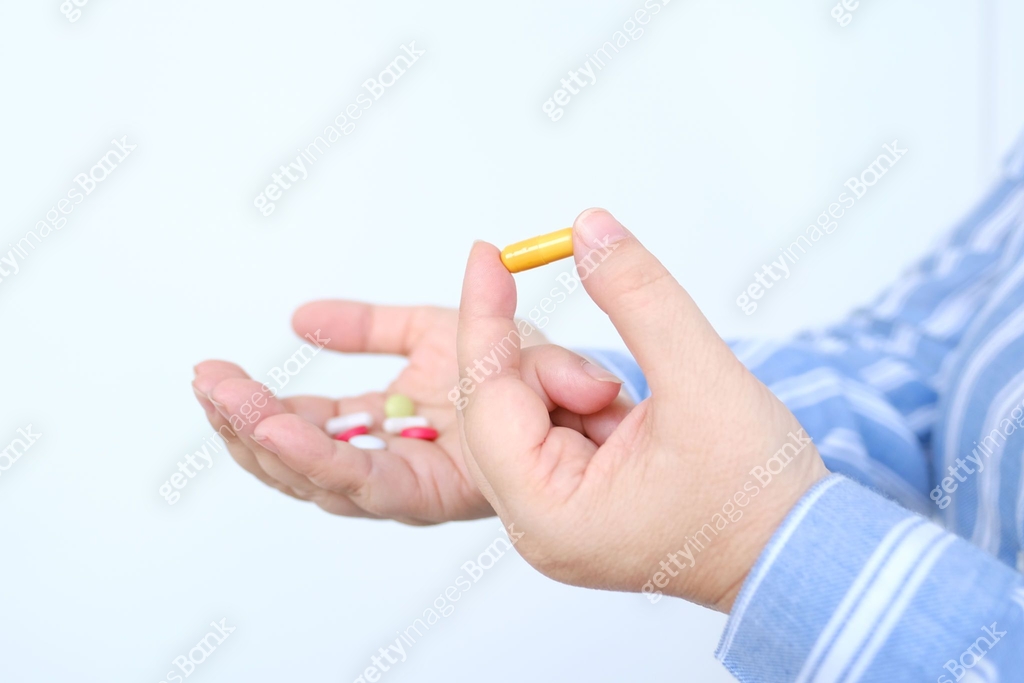 Drugs In Hand patient holds drugs in hand, female hand stretches on palm pills ...
