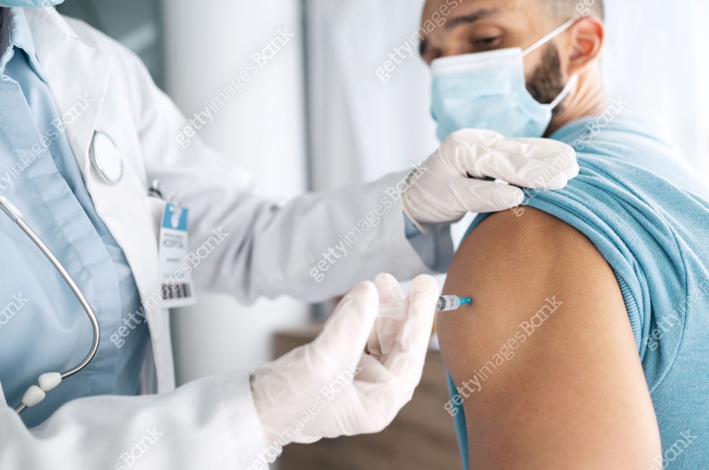 Doctor, hands and patient for injection, vaccine or flu shot at ...