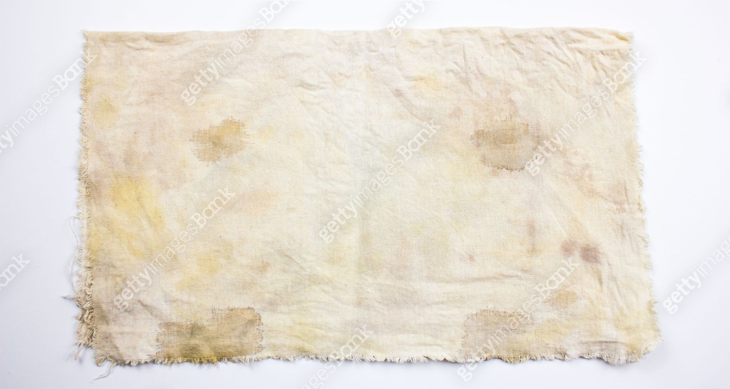 Dirty rag. Stained fabric, the surface of the fabric is stained. Fabric ...
