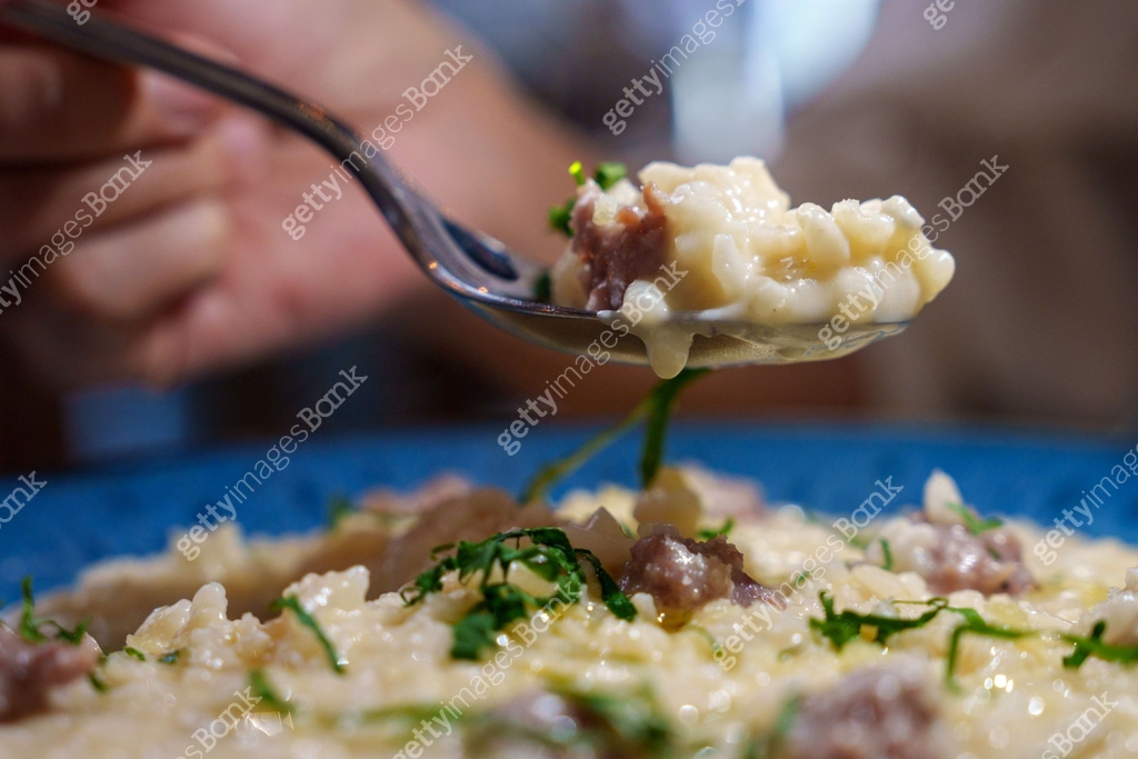 A plate of risotto ready to eat 이미지 (1736453356) - 게티이미지뱅크