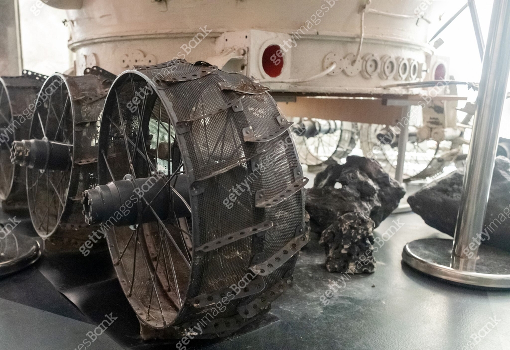 Mars rover. Imitation of a Mars rover wheel close-up. The stones ...