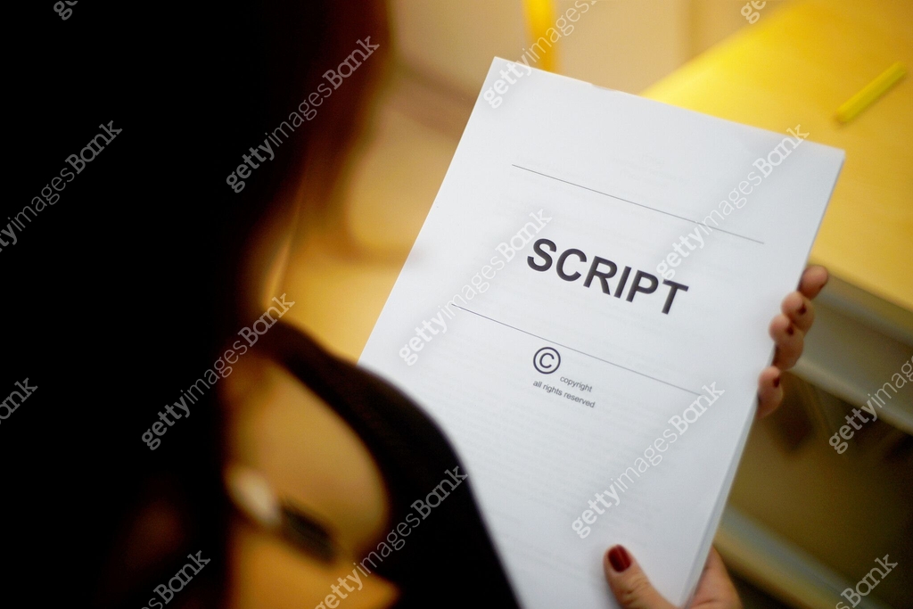 Labled Script Screenwriter holds folder of documents labeled script 이미지 (1763479994 ...