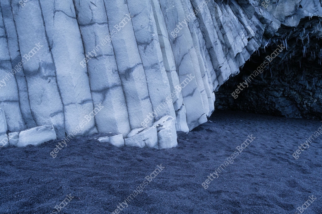 Basalt stones as a background. Reynisfjara Beach, Iceland. Sharp rocks ...