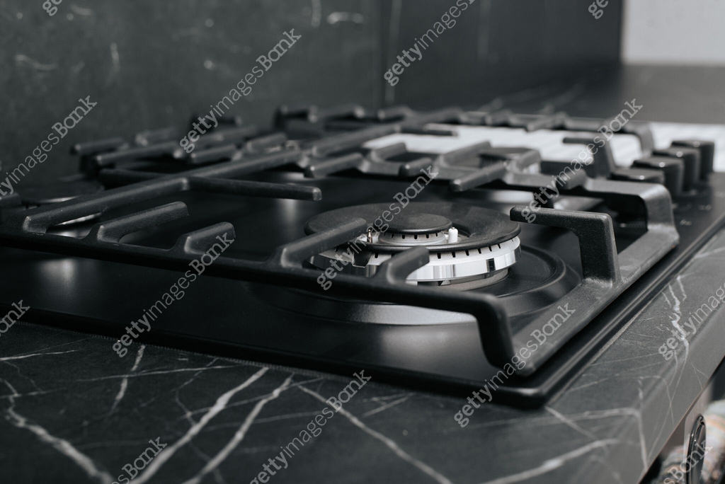 Gas panel installed in a dark countertop in kitchen, close-up 이미지 ...