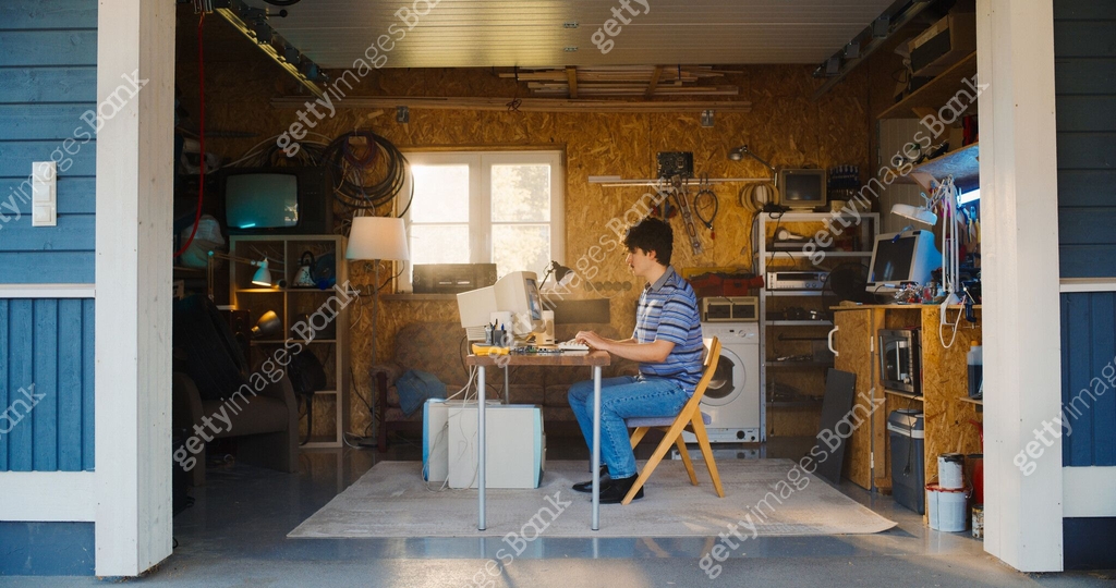 Caucasian Male Software Engineer Programming On Old Desktop Computer In ...