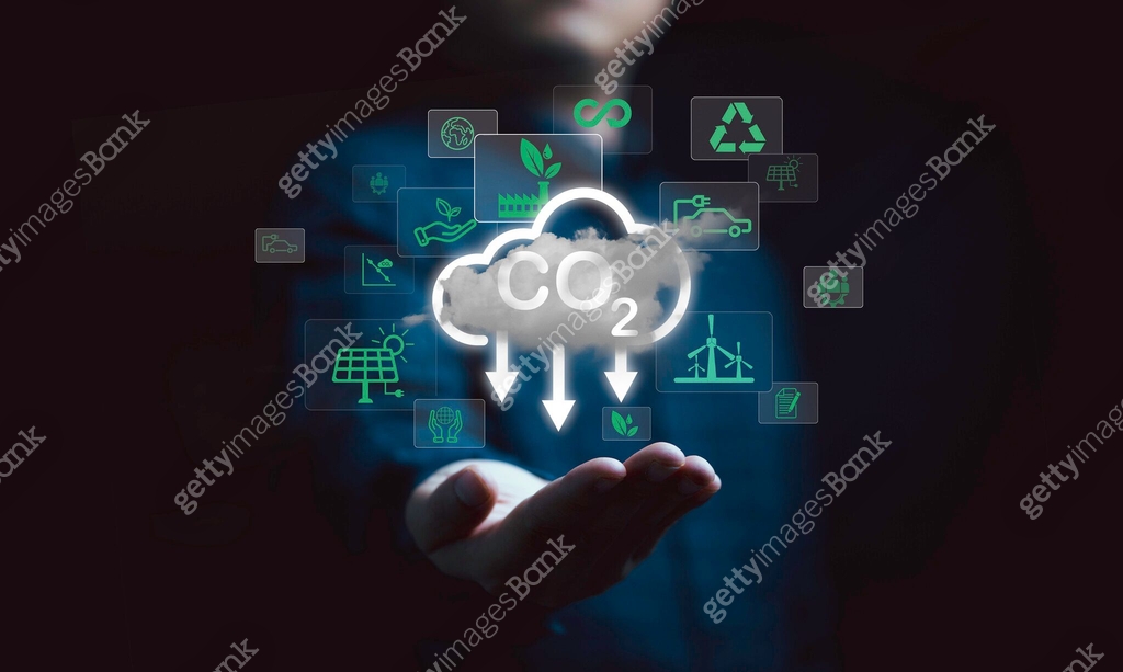 premium photo | hand holding co2 reducing virtual icon... Man holding cloud with CO2 reducing icon for decrease CO2 , carbon ...