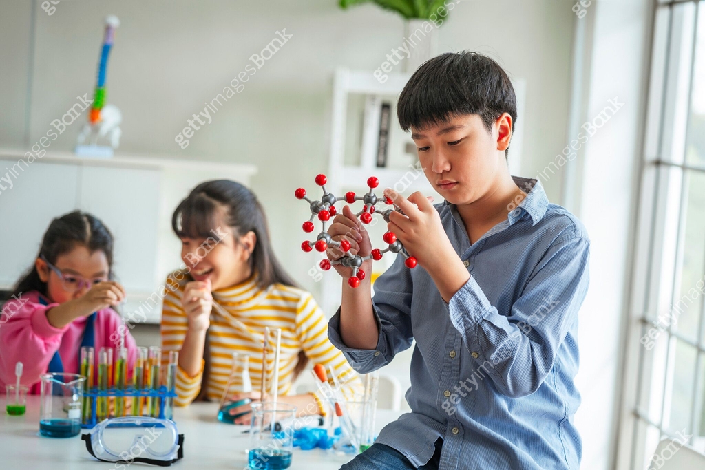 Using Structures In Science children boy using vr learning molecular structure in science ...