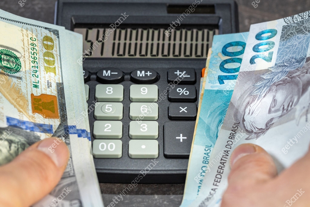 Currency rates, dollar and Brazilian real pair, Financial concept