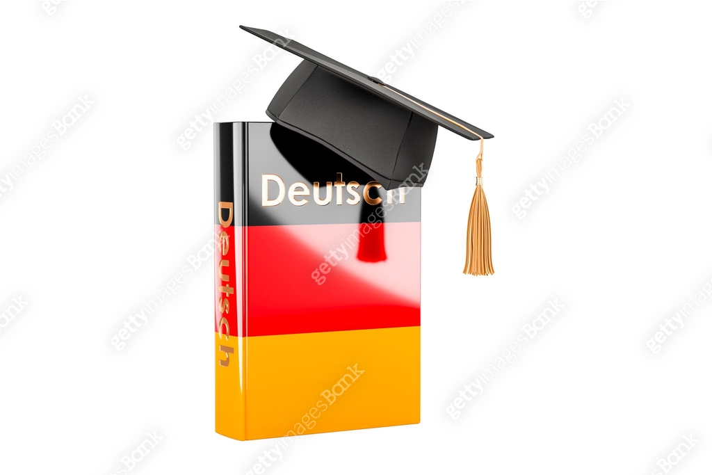 German language textbook with graduation cap. Learn German language ...