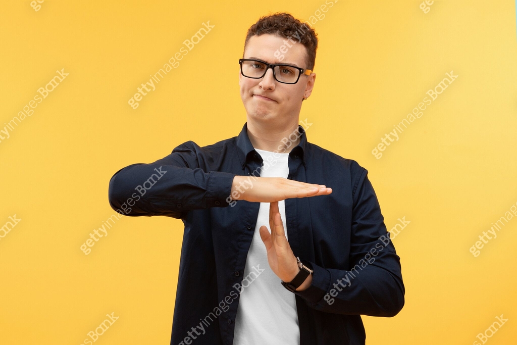 Timeout Images Serious tired young man showing timeout symbol with hands 이미지 ...