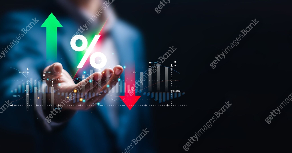 Financial interest rates and mortgage rates, businessman holding ...