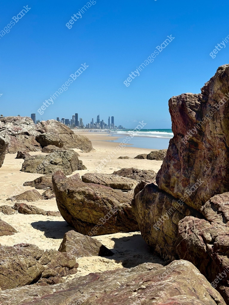 Looking through the rocks at North Burleigh Beach. Surfers Paradise in ...
