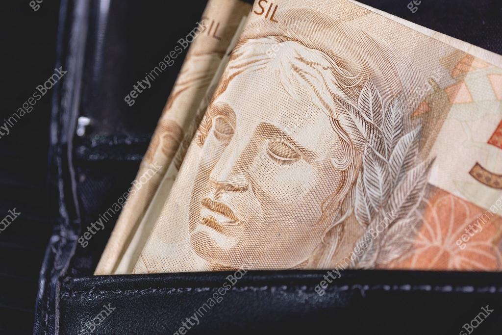 Brazilian Real notes inside a wallet. Brazilian economy and finance ...
