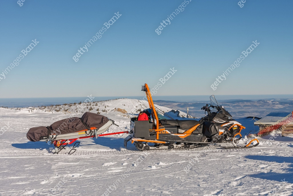 Snowmobile with stretcher mountain rescue service in front of Silesian ...
