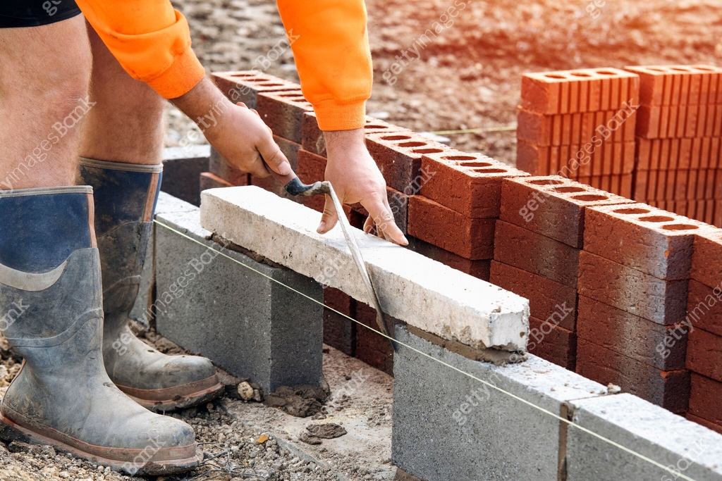 Bricklayer Projects Construction Worker Bricklayer Placing Concrete Block During ...