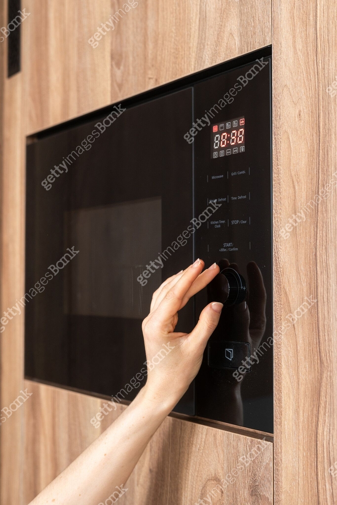 Microwave Timer Window Hand adjusting microwave timer, heating of food at home 이미지 (2163300037 ...