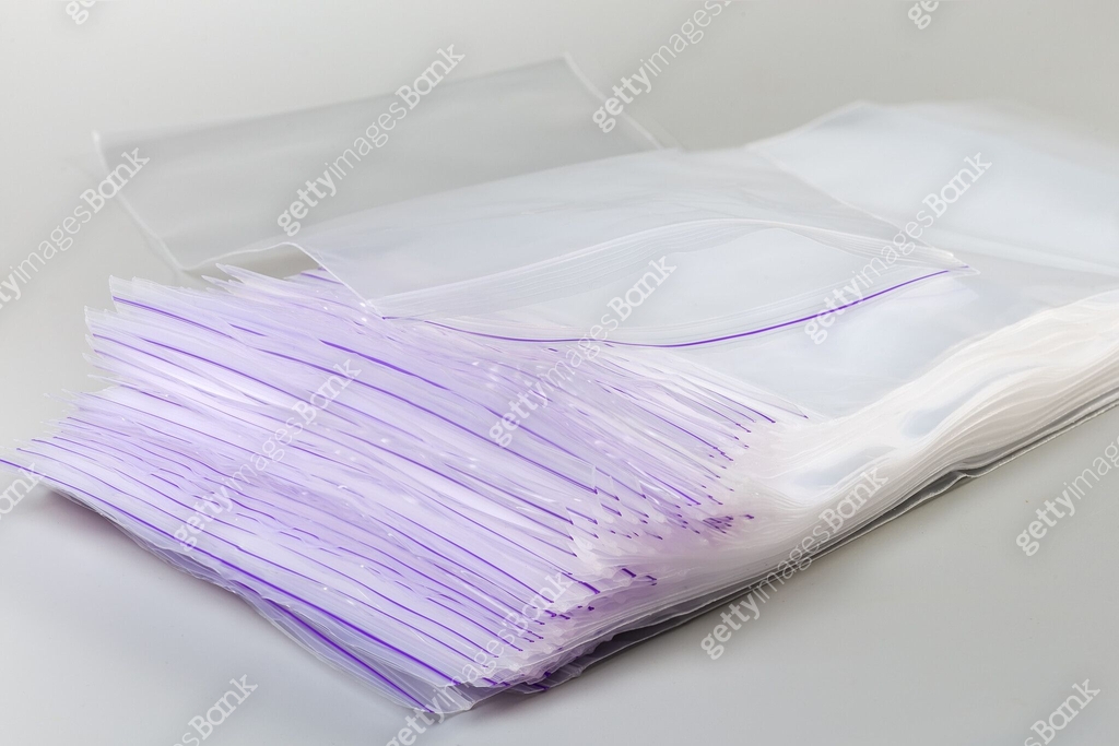 Zipper Stack Stack of plastic transparent reclosable zipper storage bags close-up ...