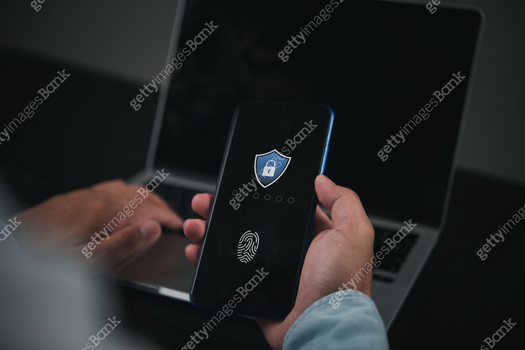 Smartphobe Using Person using smartphone with fingerprint authentication, ensuring ...
