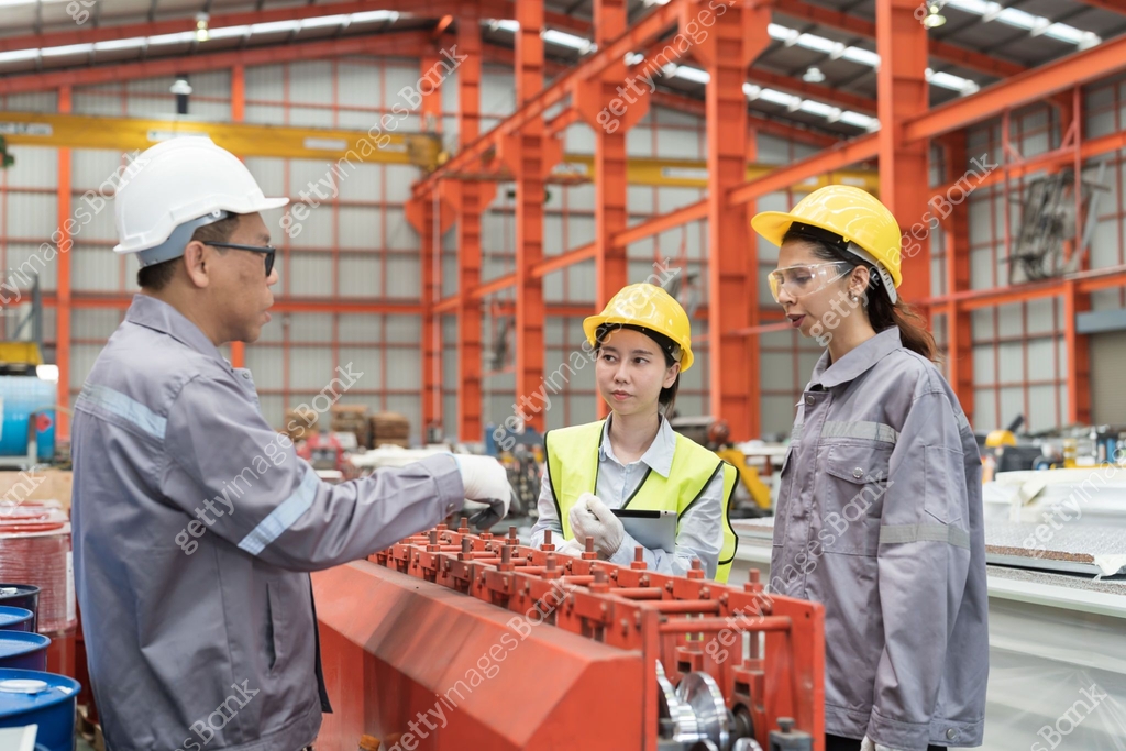 Factory Worker Process Asian male and female factory worker work training for conveyor at ...