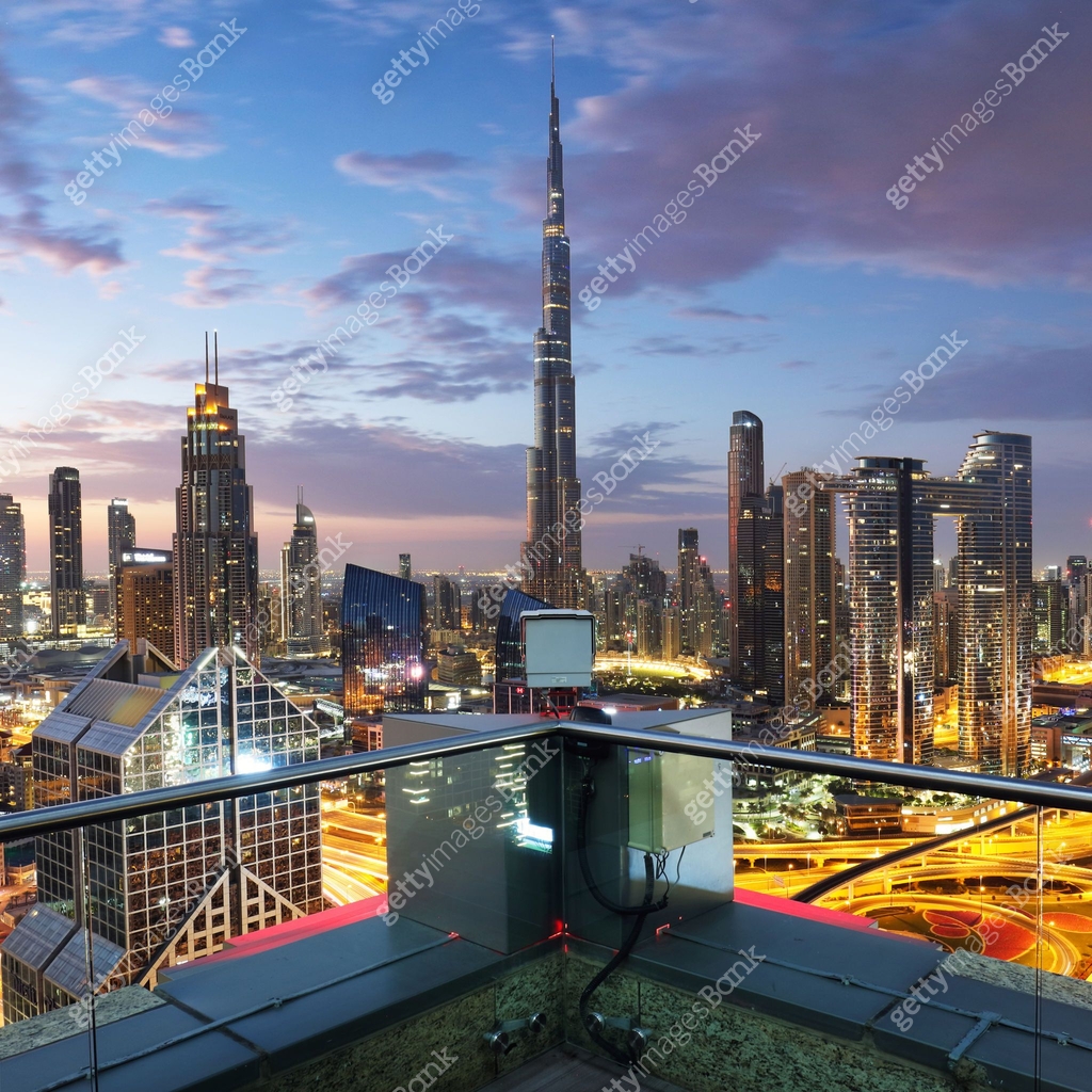 Uae Projects Rooftop Fantastic rooftop view of Dubai's modern architecture by night with ...