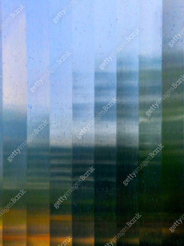 the matte sheet is bent into a striped texture. cladding made of ...