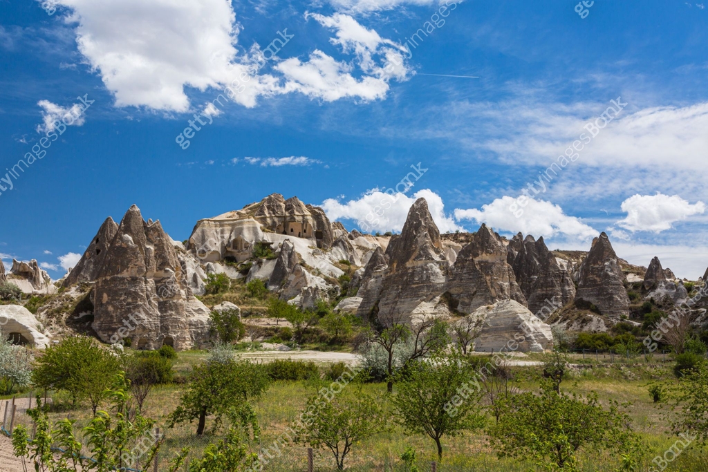 Strange rocks and cave dwellings in Goreme National Park in Cappadocia ...