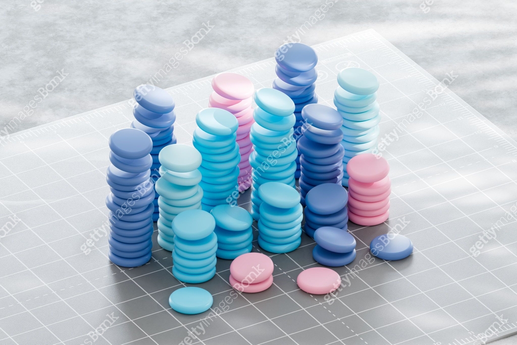 Stacked and colored coins, data visualization concept, finance ...