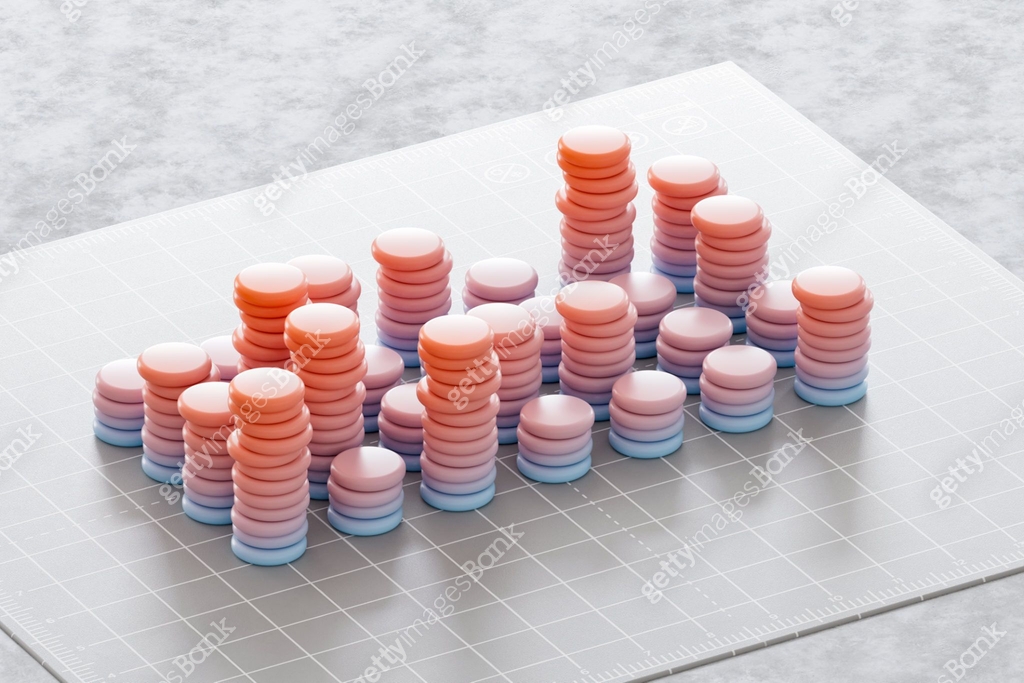 Stacked and colored coins, data visualization concept, finance ...