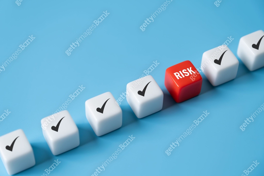 close up at the red cube to identify red danger risk cube among other ...